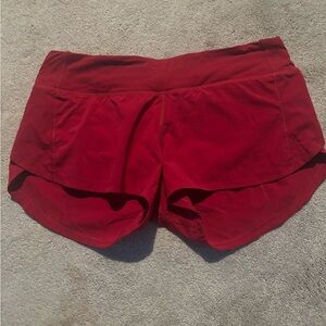 red lululemon shorts